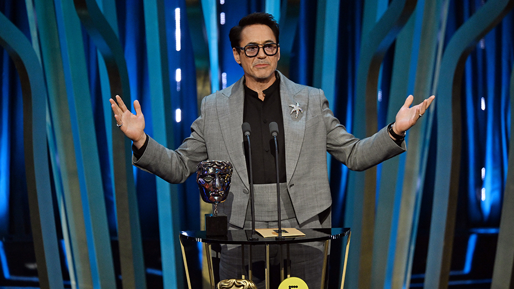 LONDON, ENGLAND - FEBRUARY 18: Robert Downey Jr. accepts the Supporting Actor Award for