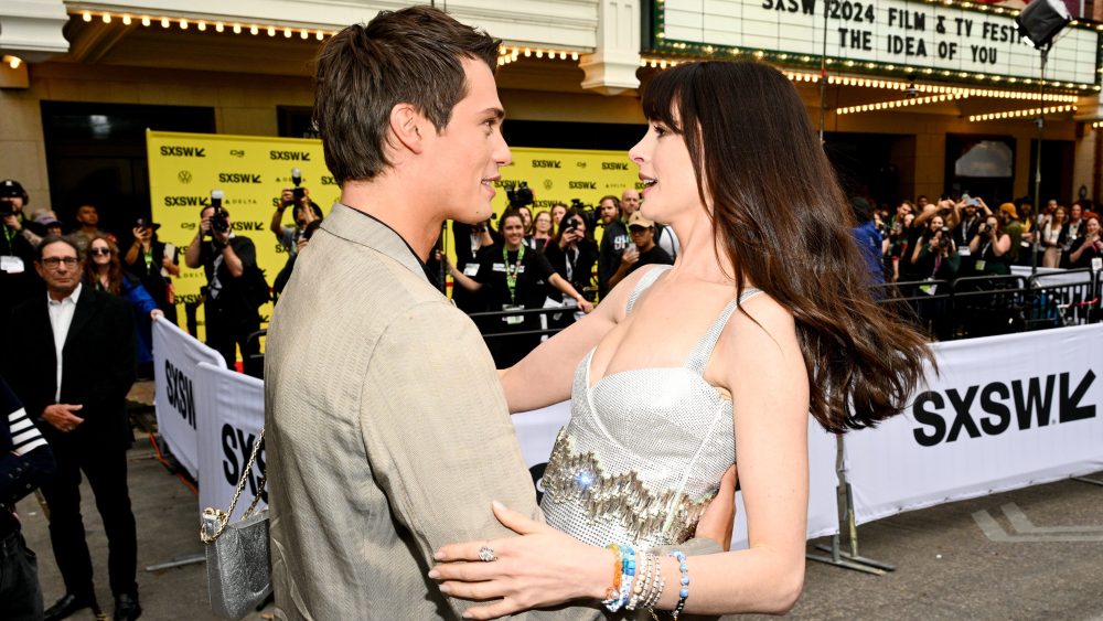 Nicholas Galitzine and Anne Hathaway