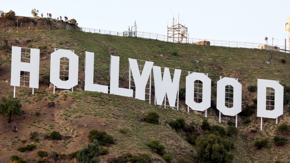 LOS ANGELES, CALIFORNIA - JULY 12: The Hollywood sign stands as the WGA (Writers Guild of America) strike continues on July 12, 2023 in Los Angeles, California. Members of SAG-AFTRA, which represents actors and other media professionals, may go on strike by 11:59 p.m. today which could shut down Hollywood productions completely with the writers in the third month of their strike against Hollywood studios. (Photo by Mario Tama/Getty Images)