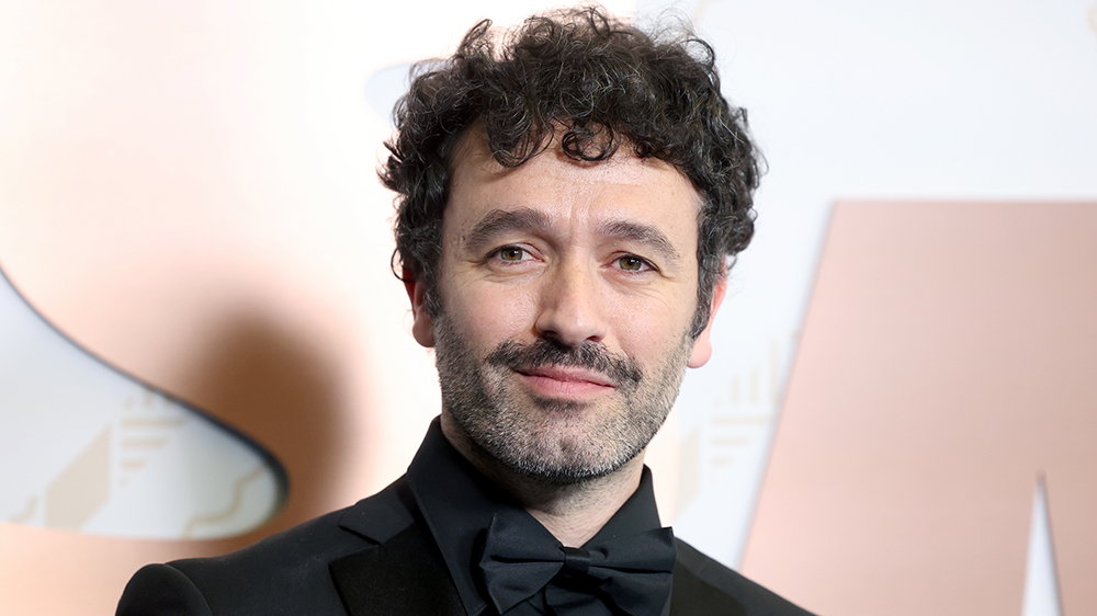 PARIS, FRANCE - FEBRUARY 24: Rodrigo Sorogoyen poses with the "Best foreign film" César Award for the movie "As Bestas" during the 48th Cesar Film Awards at L